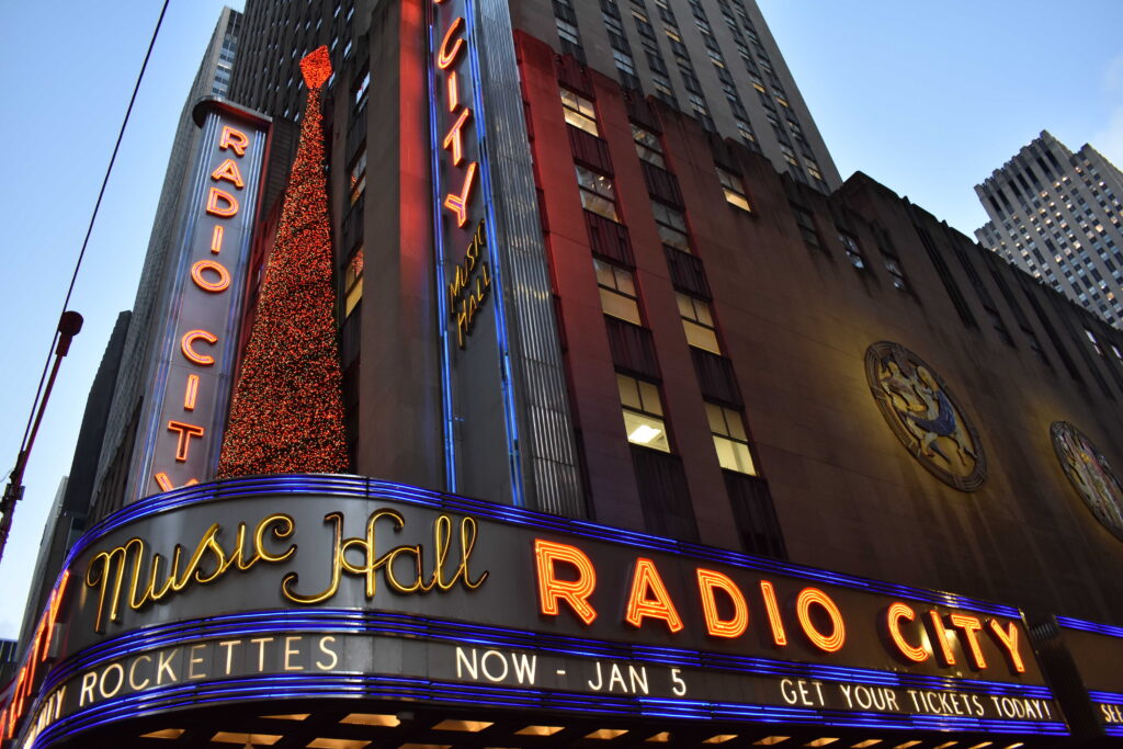 This is an image of the illuminated marquee at Radio City Music Hall in New York City NYC.