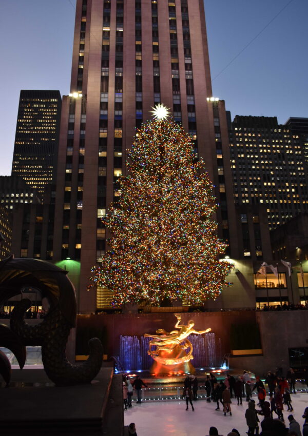 This is an image of the Rockefeller Center Christmas tree in New York City. - Are you visiting NYC this holiday season? Find the best things to do and plan out your entire New York City Christmas itinerary!