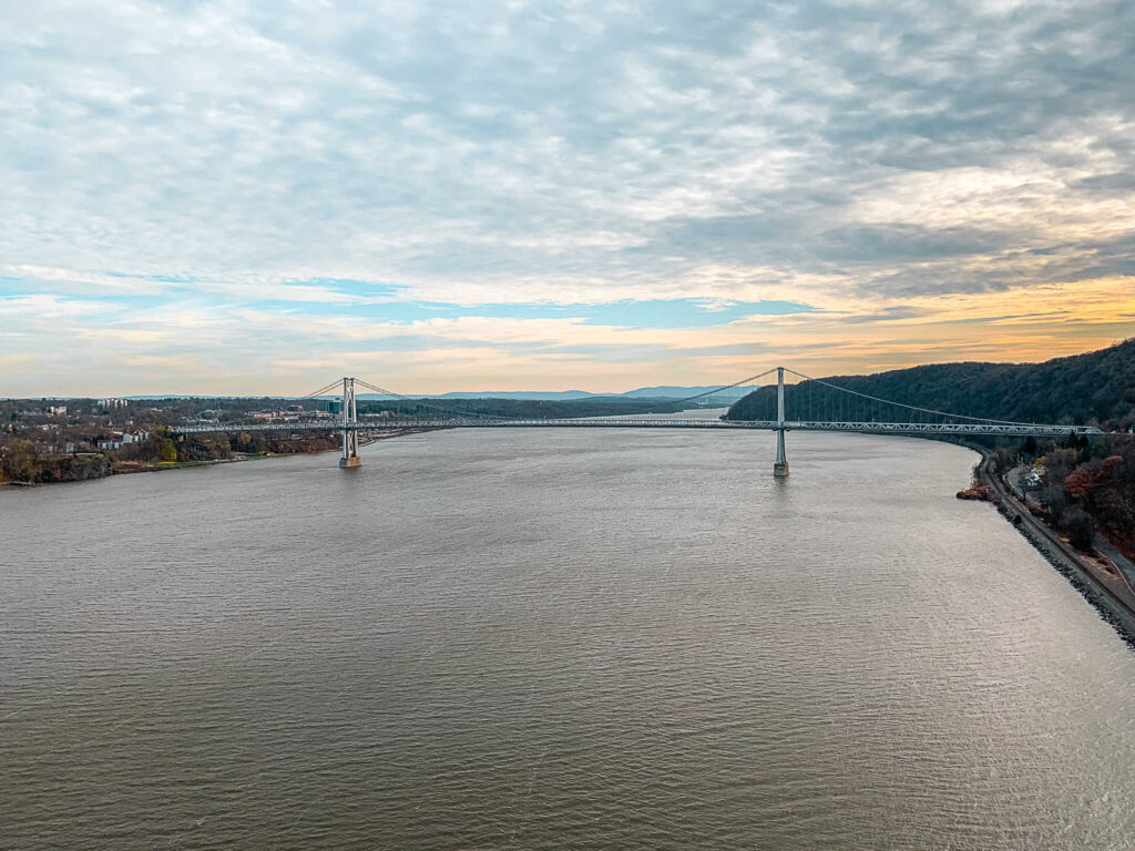 This is an image of the view at sunset from the Walkway Over the Hudson in Poughkeepsie, New York. 