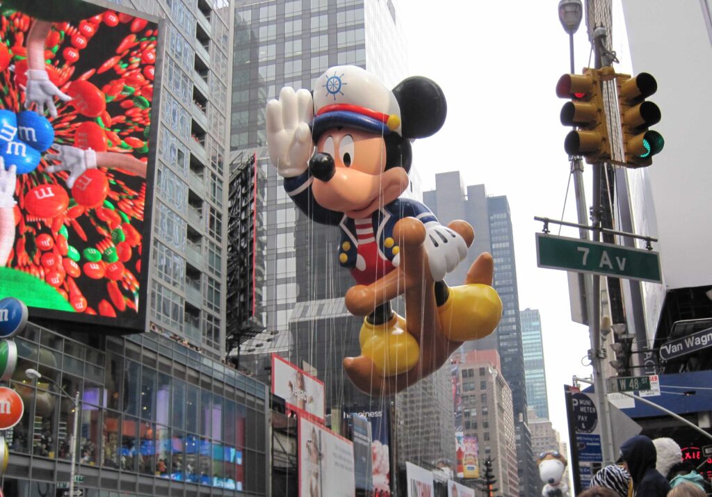This is an image of the Mickey Mouse balloon during the Macy's Thanksgiving Day parade in New York City.