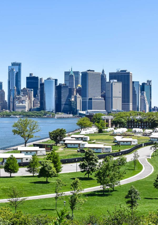 The view of the whole Collective Retreat's Governor's Island location in New York City with Lower Manhattan in the background.
