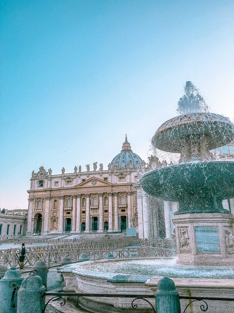 This is an image of the fountain in front of Saint peter's basilica in the Vatican.
