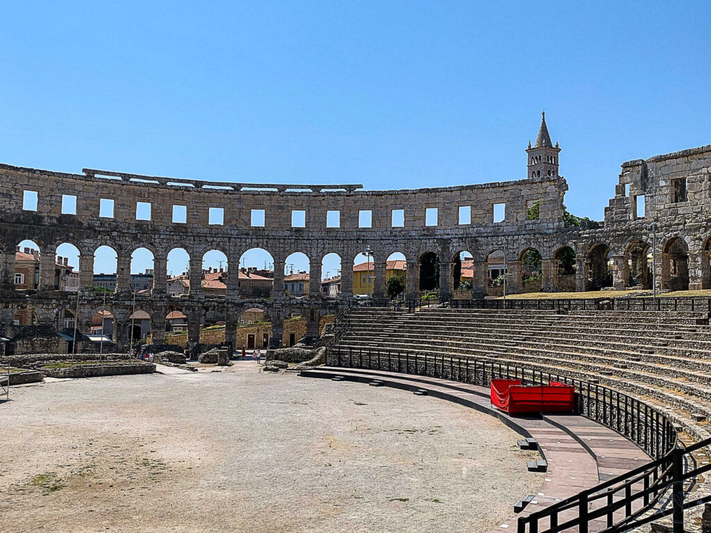 This is an image of the ground and the stands of inside the Pula Arena in Pula, Croatia.