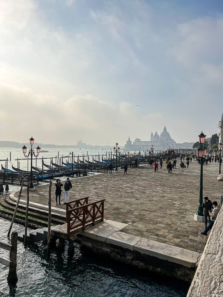 This is an image of the Riva in Venice Italy in late afternoon with fog on the Grand Canal.
