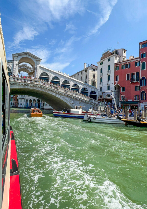 This is an image of the Rialto Bridge from a vaporetto on the Grand Canal in Venice, Italy.