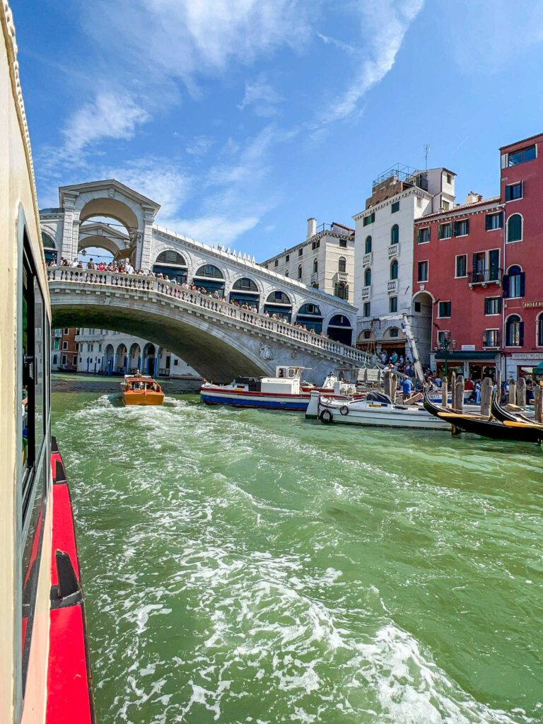 This is an image of the Rialto Bridge from a vaporetto on the Grand Canal in Venice, Italy.